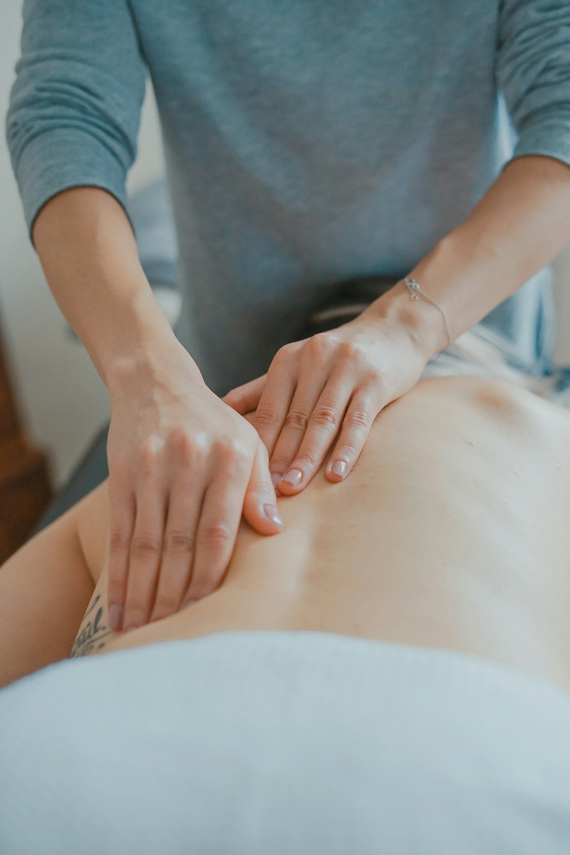 Deep tissue massage targeting upper back muscle tension